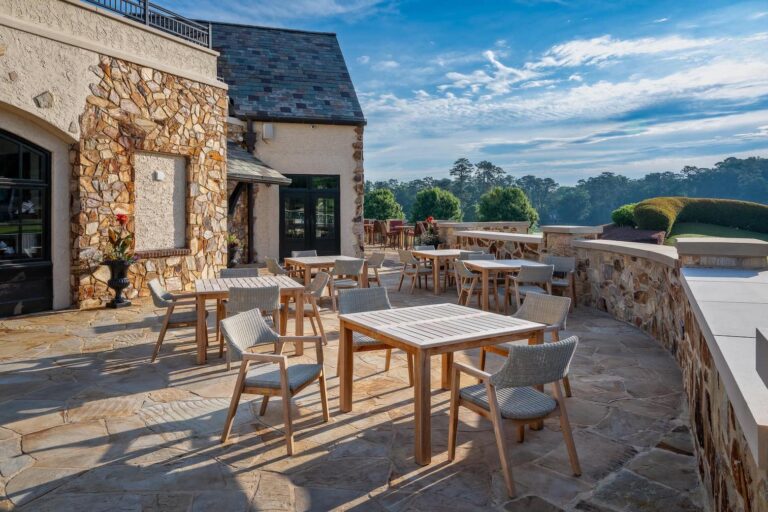 Capital City Brookhaven's outdoor patio overlooking the Tennis Courts