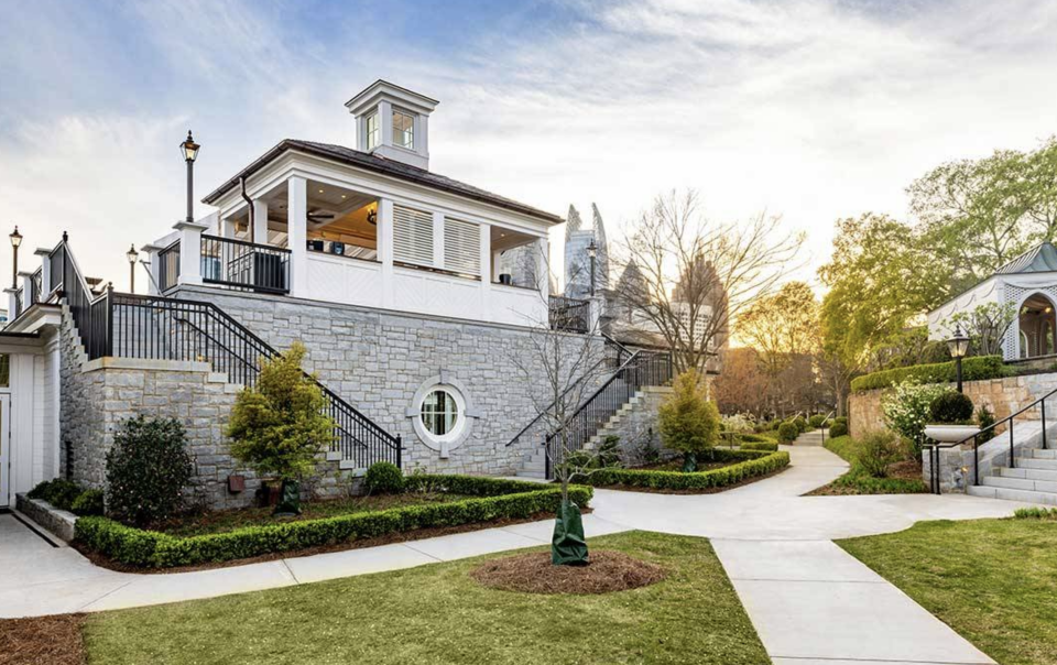 Front facade and walking paths with stairs to the new Piedmont Driving Club Poolside Bar and Event Space featuring a two-story restaurant, bar, and versatile event space located adjacent to the existing pool.