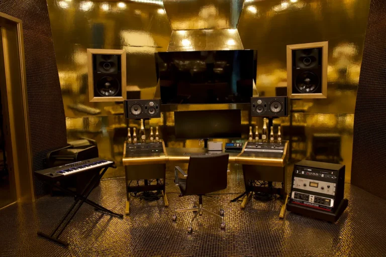 Private studio mixing room with gold interior and acoustical design for Sovereign’s immersive branding