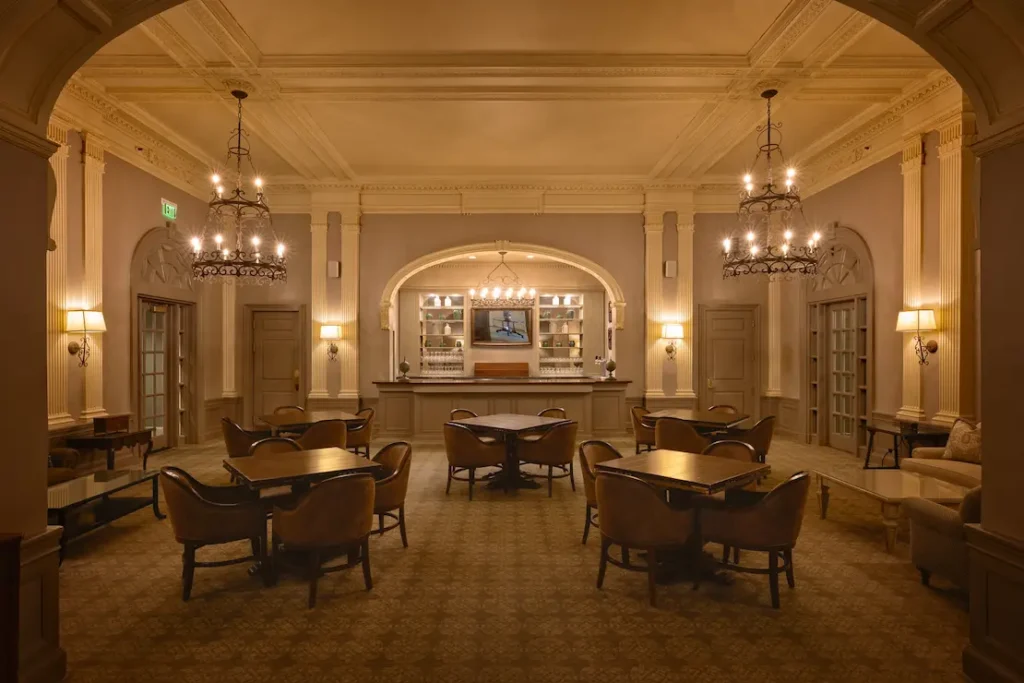 Elegant clubhouse lounge with ambient lighting and upgraded AV system
