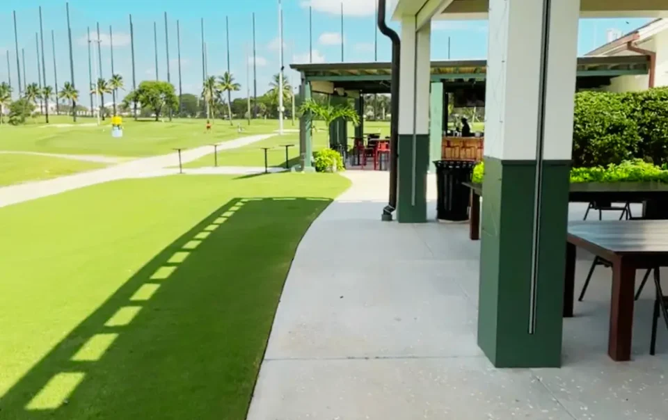 Elevated speaker view across The Lit 9 par-3 golf course