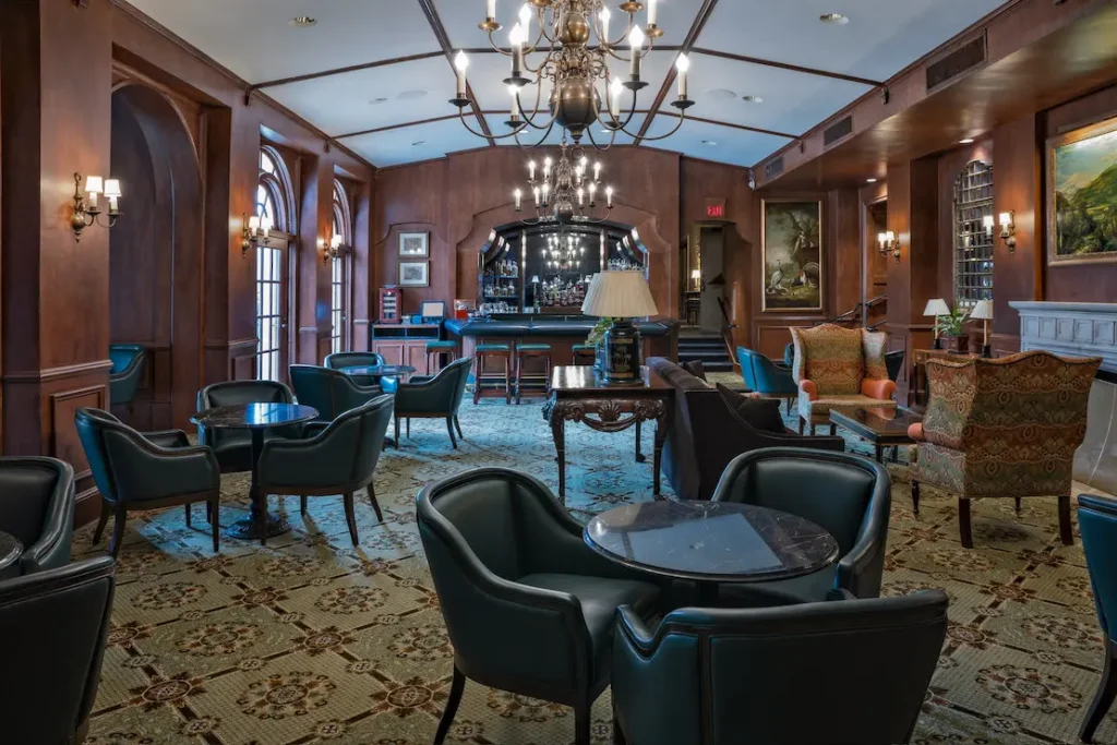 Historic private club bar area optimized with seamless wireless connectivity and hidden AV upgrades completes Macrotek's network infrastructure for private clubs plan.